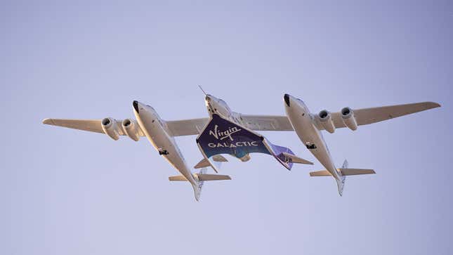 Virgin Galactic rocket flying with mother ship. 
